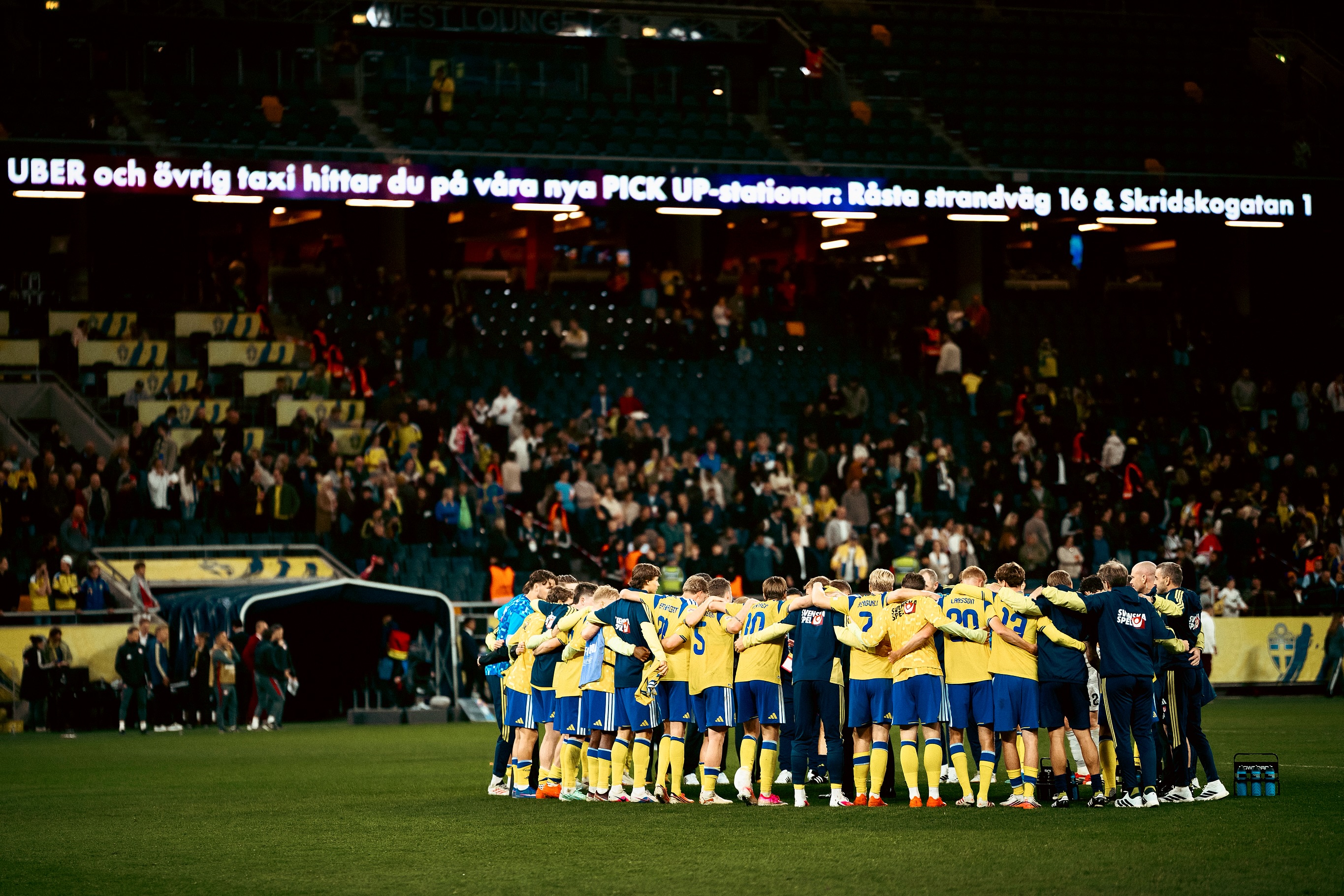 Sweden gather in a team huddle after the match.