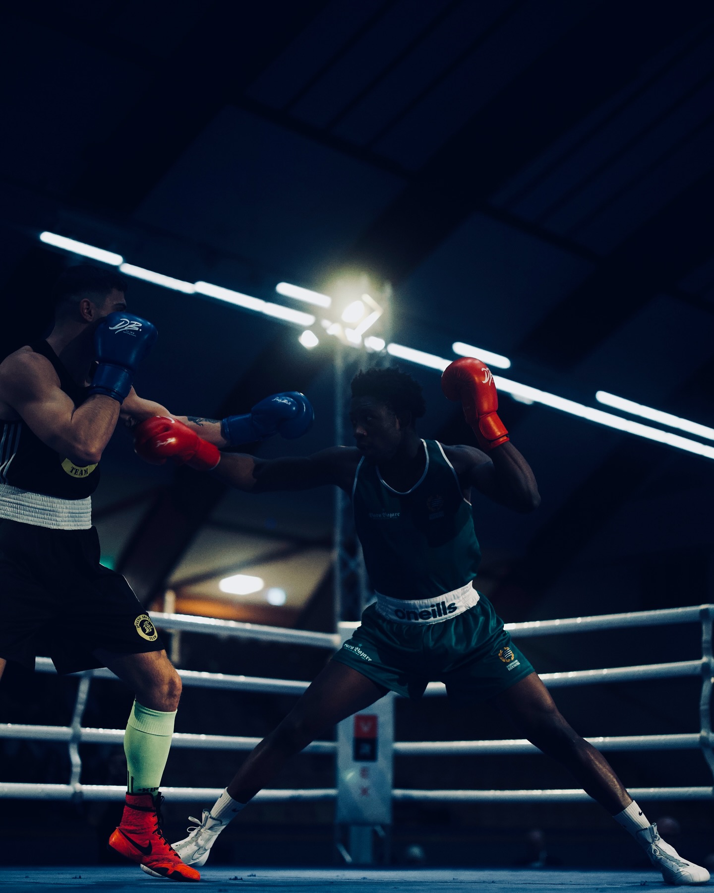 Elwin Belezika and Filippo Bruni exchange punches in the ring at Bajen Rough House.