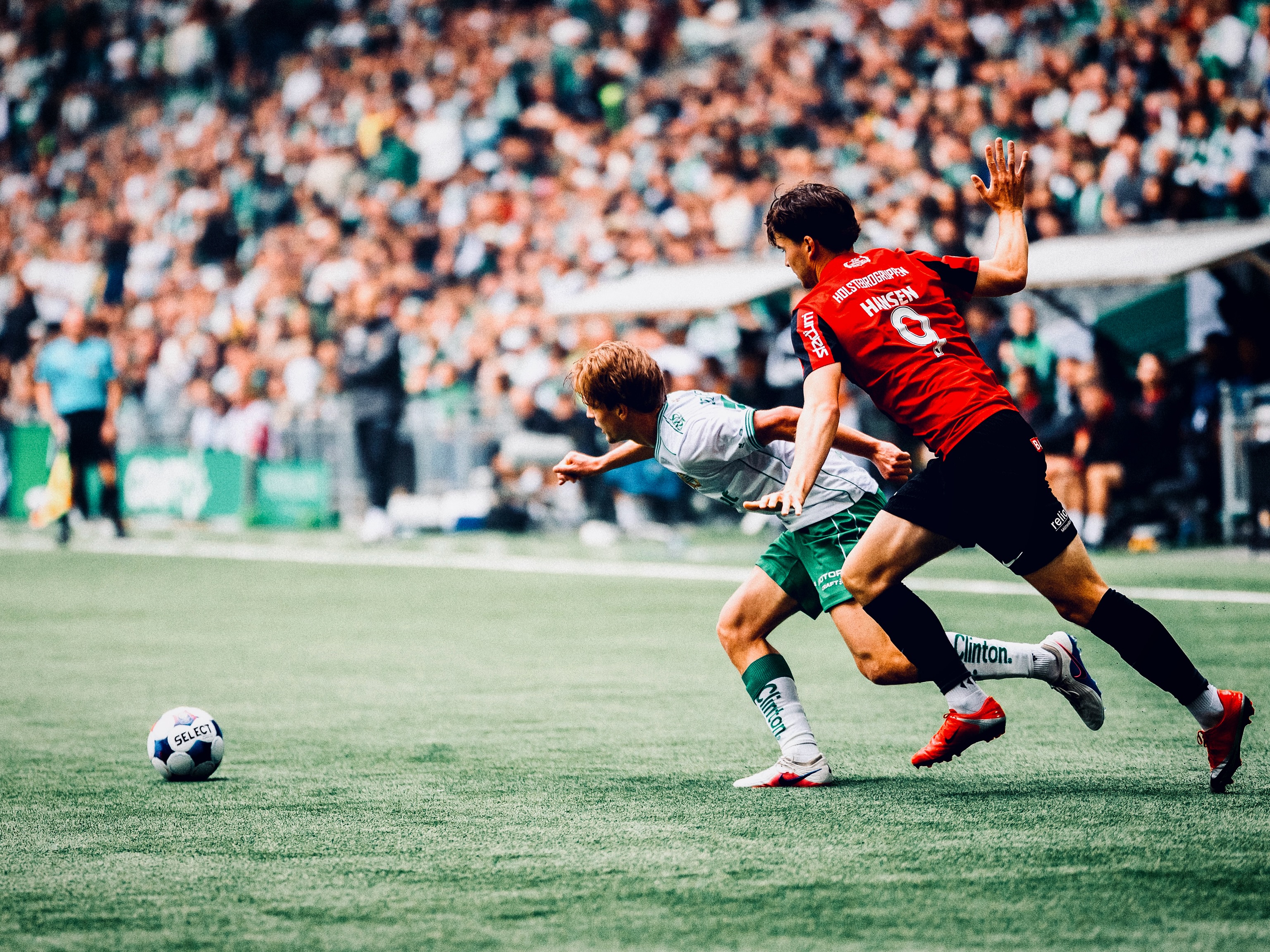 Brommapojkarna advance with the ball.