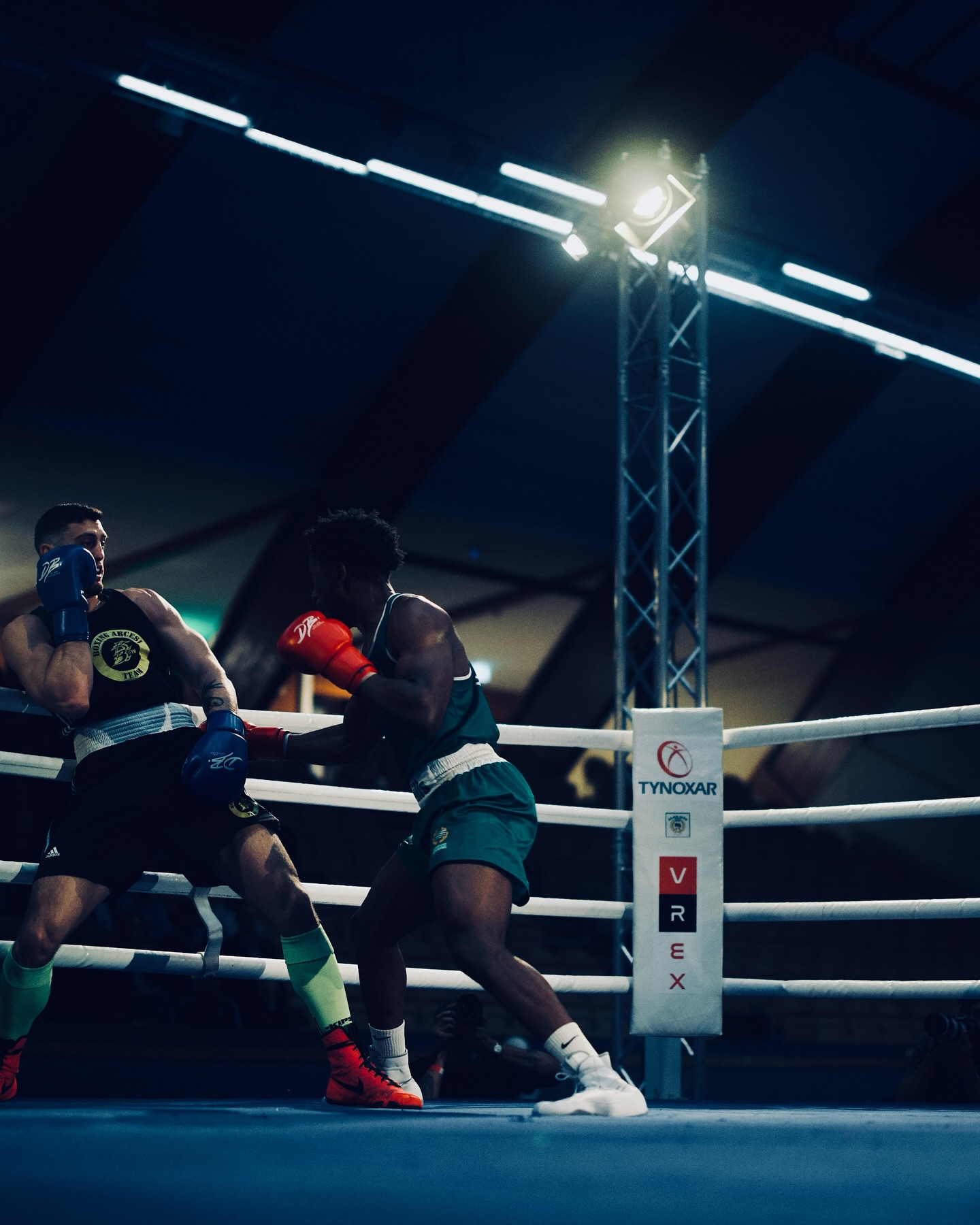 Elwin Belezika and Filippo Bruni exchange punches in the ring at Bajen Rough House.