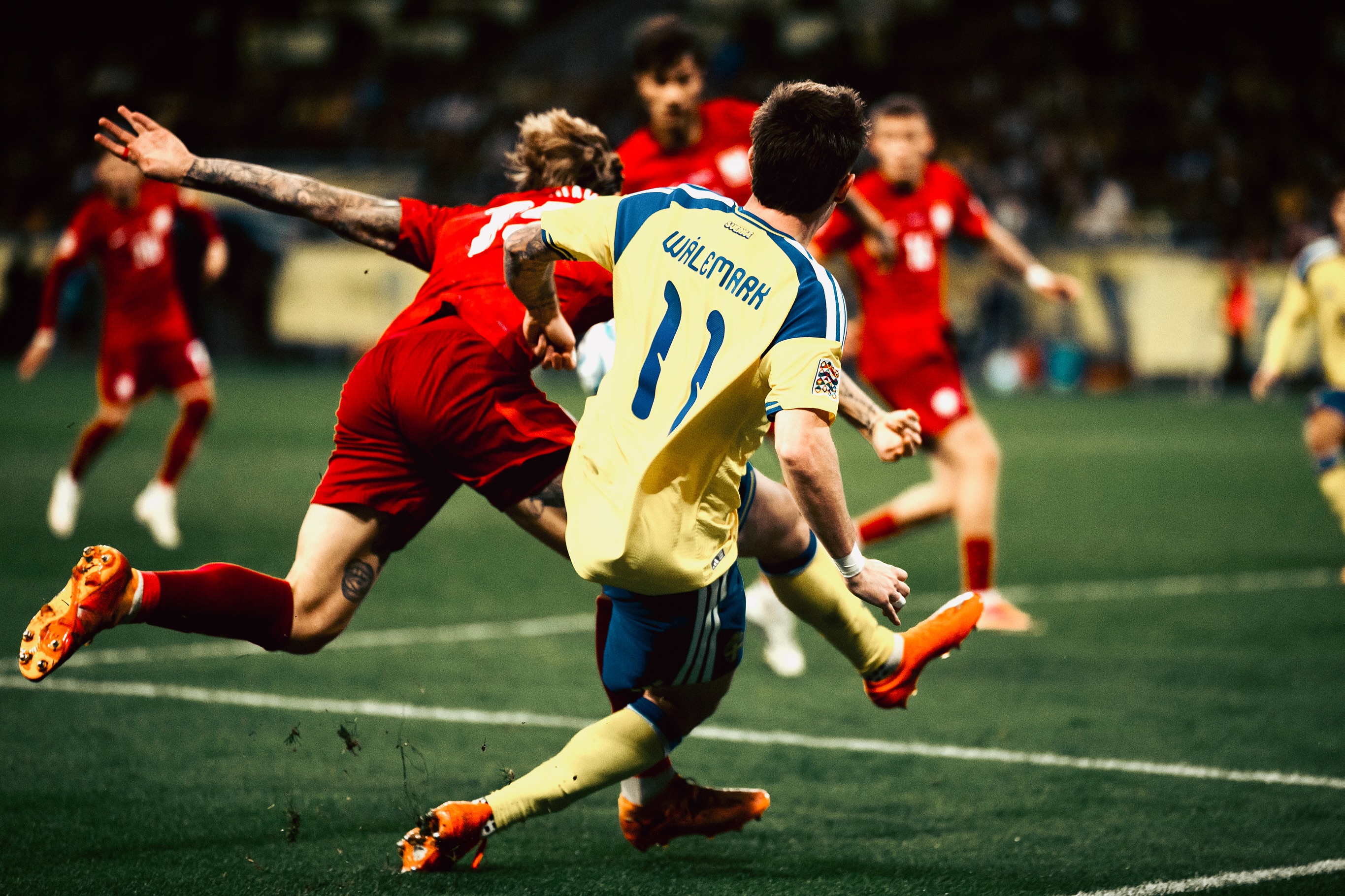 Sweden advance with the ball.