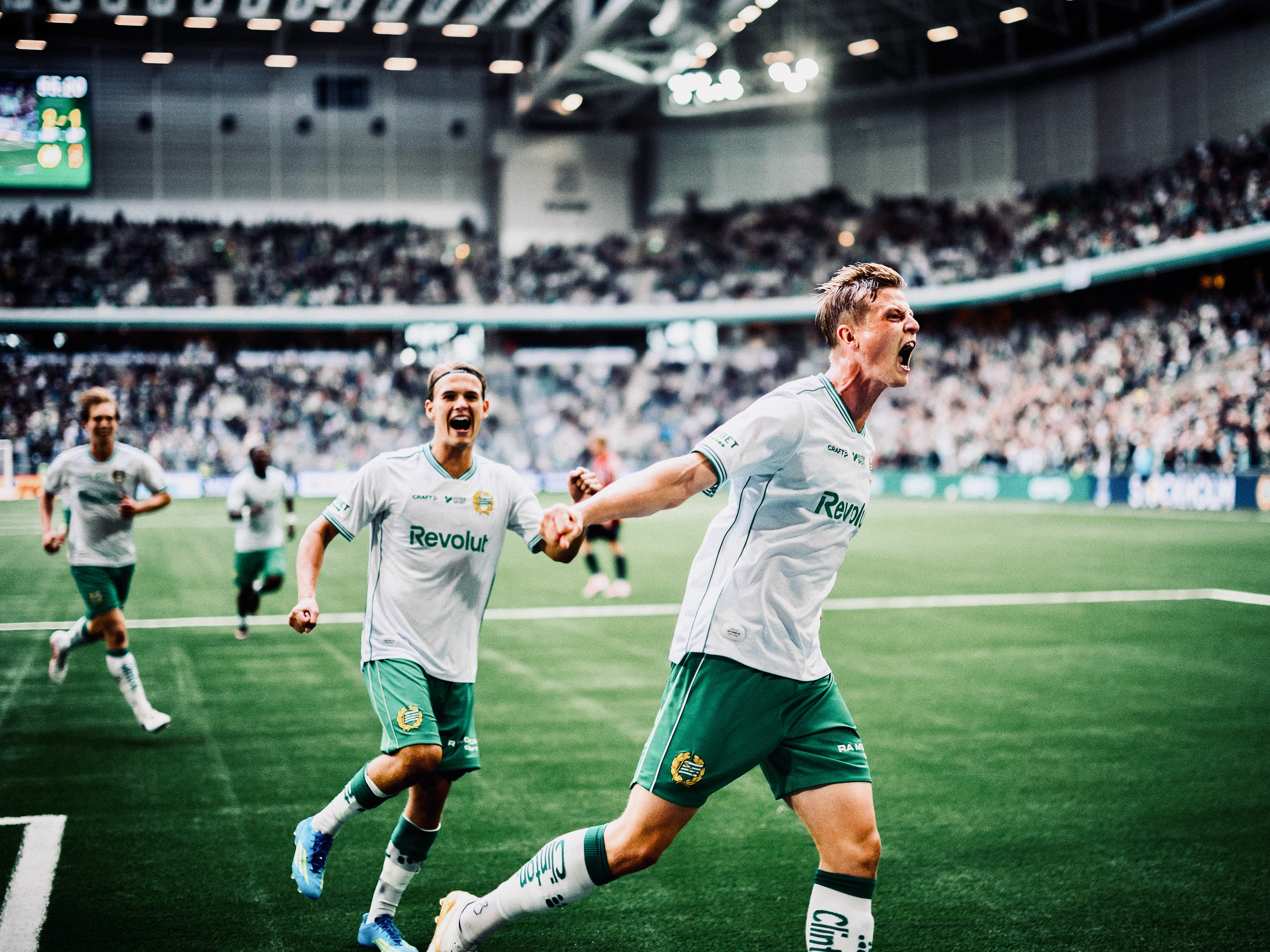 Hammarby players celebrate during the match.
