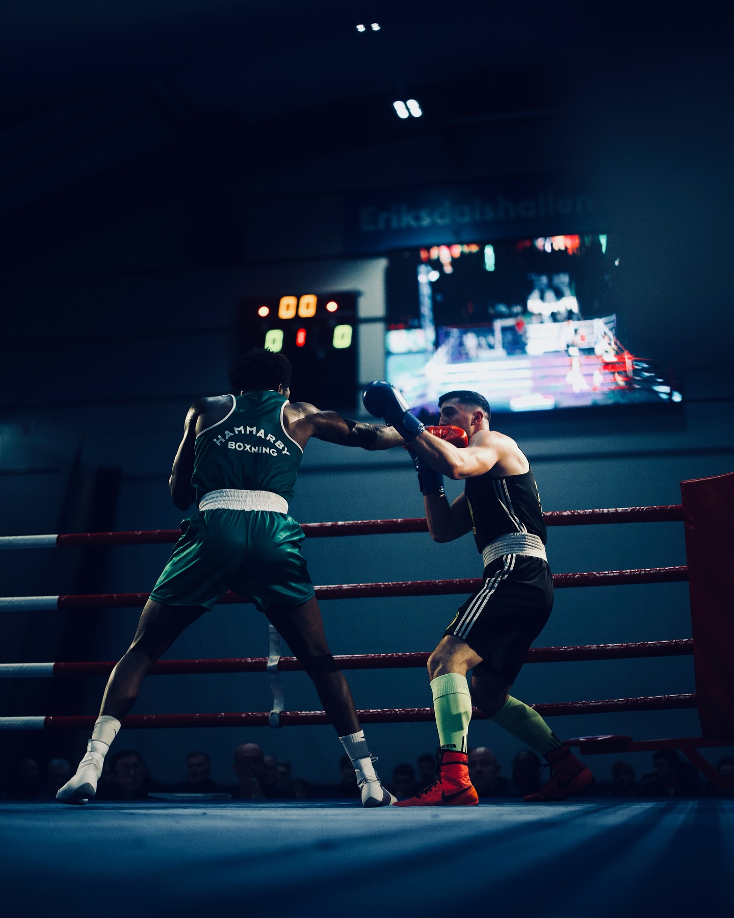 Elwin Belezika and Filippo Bruni exchange punches in the ring at Bajen Rough House.